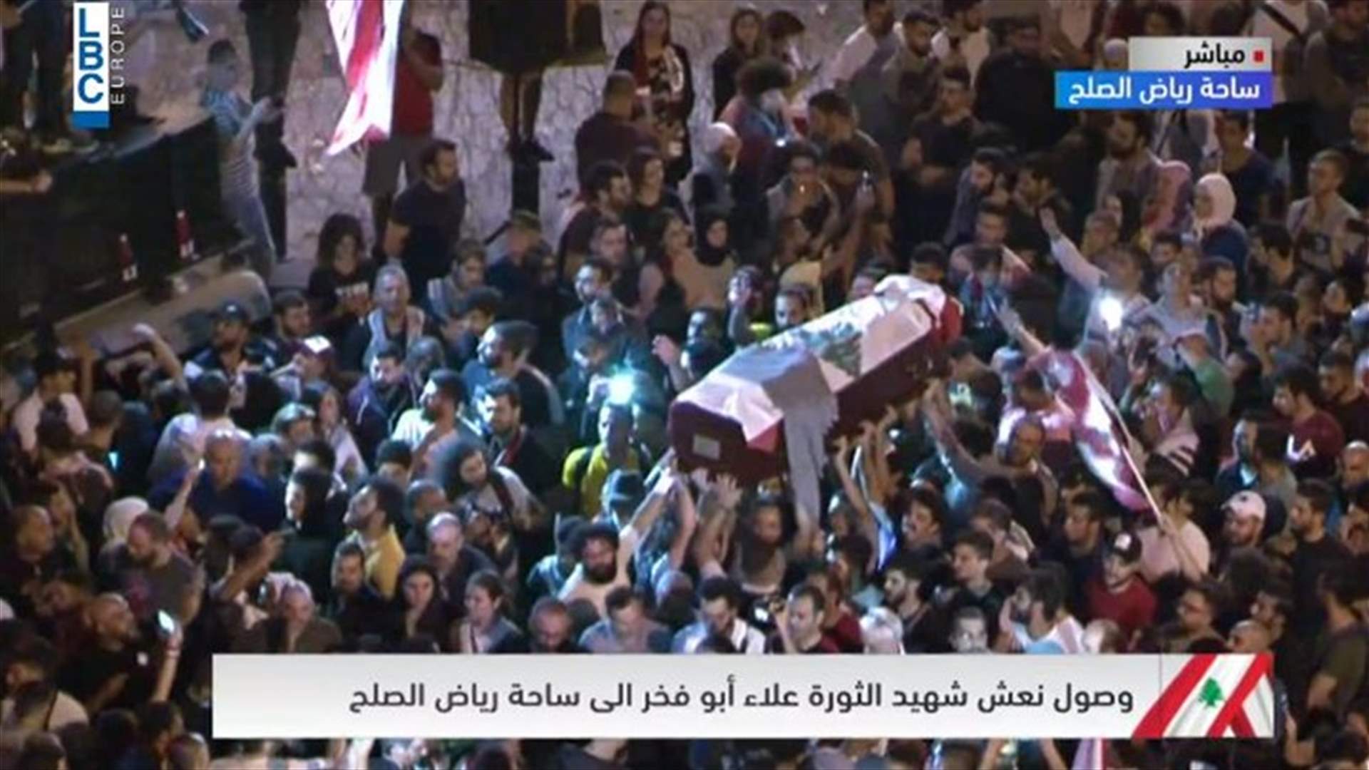 Protesters carry coffin of Revolution’s Martyr Alaa Abou Fakher in Riad al-Solh (Video)
