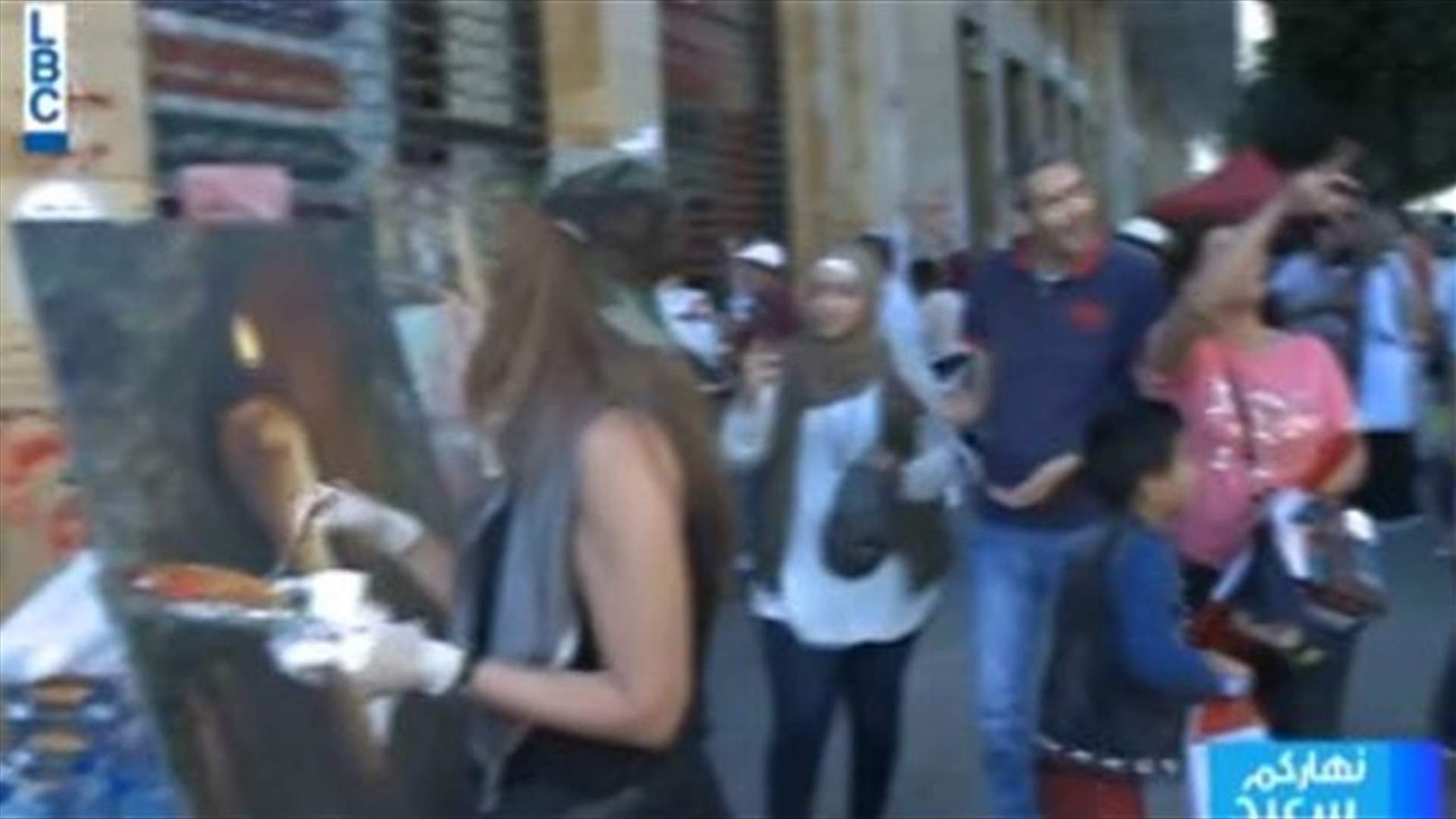 Artists create revolutionary paintings in central Beirut (Video)