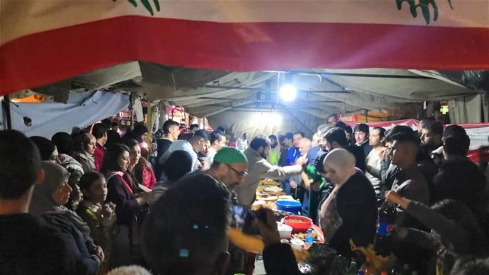 عشاء عن روح علاء أبو فخر في ساحة الاعتصام في حلبا