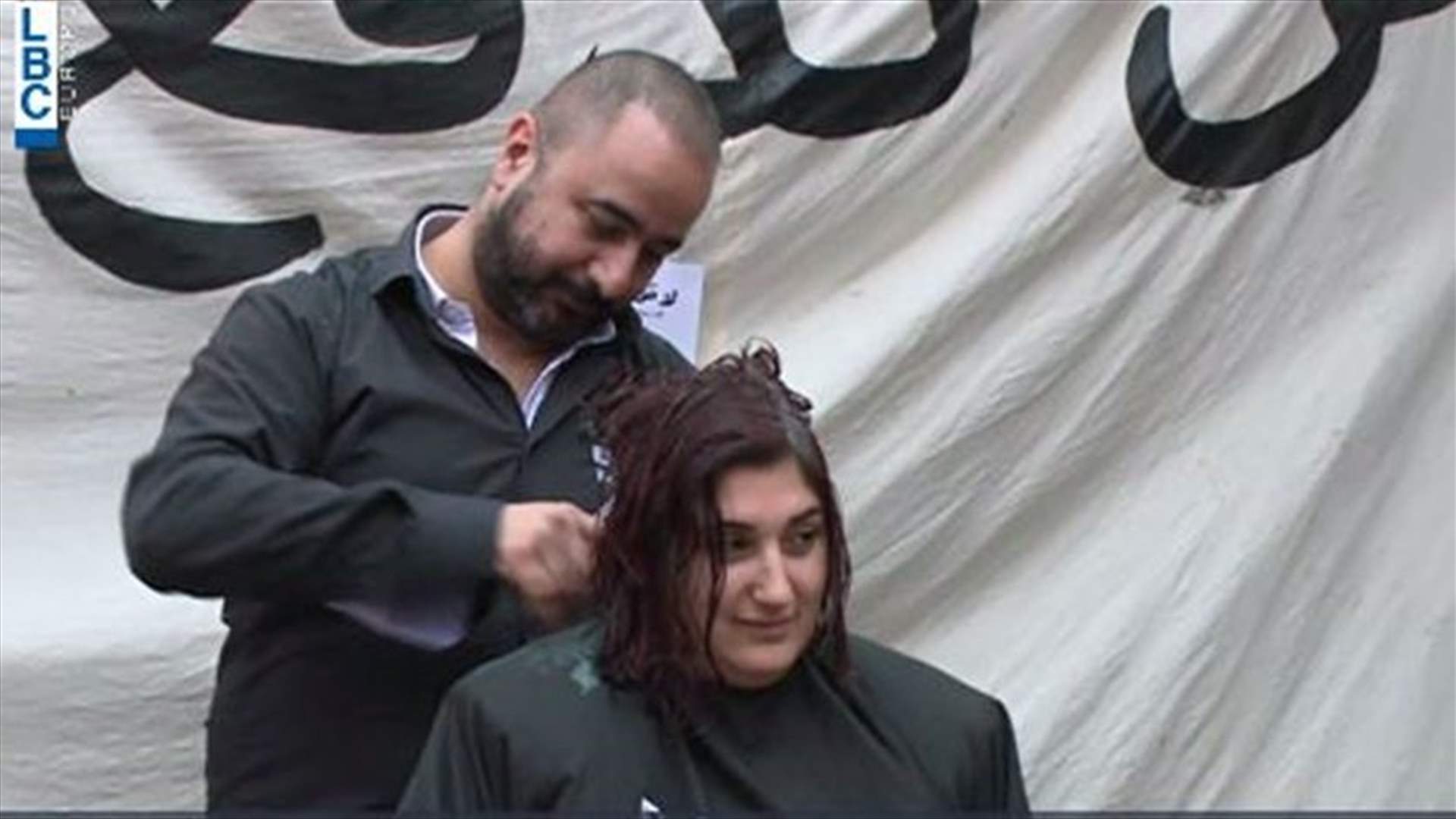 Haircut outside Banque Du Liban (Video)