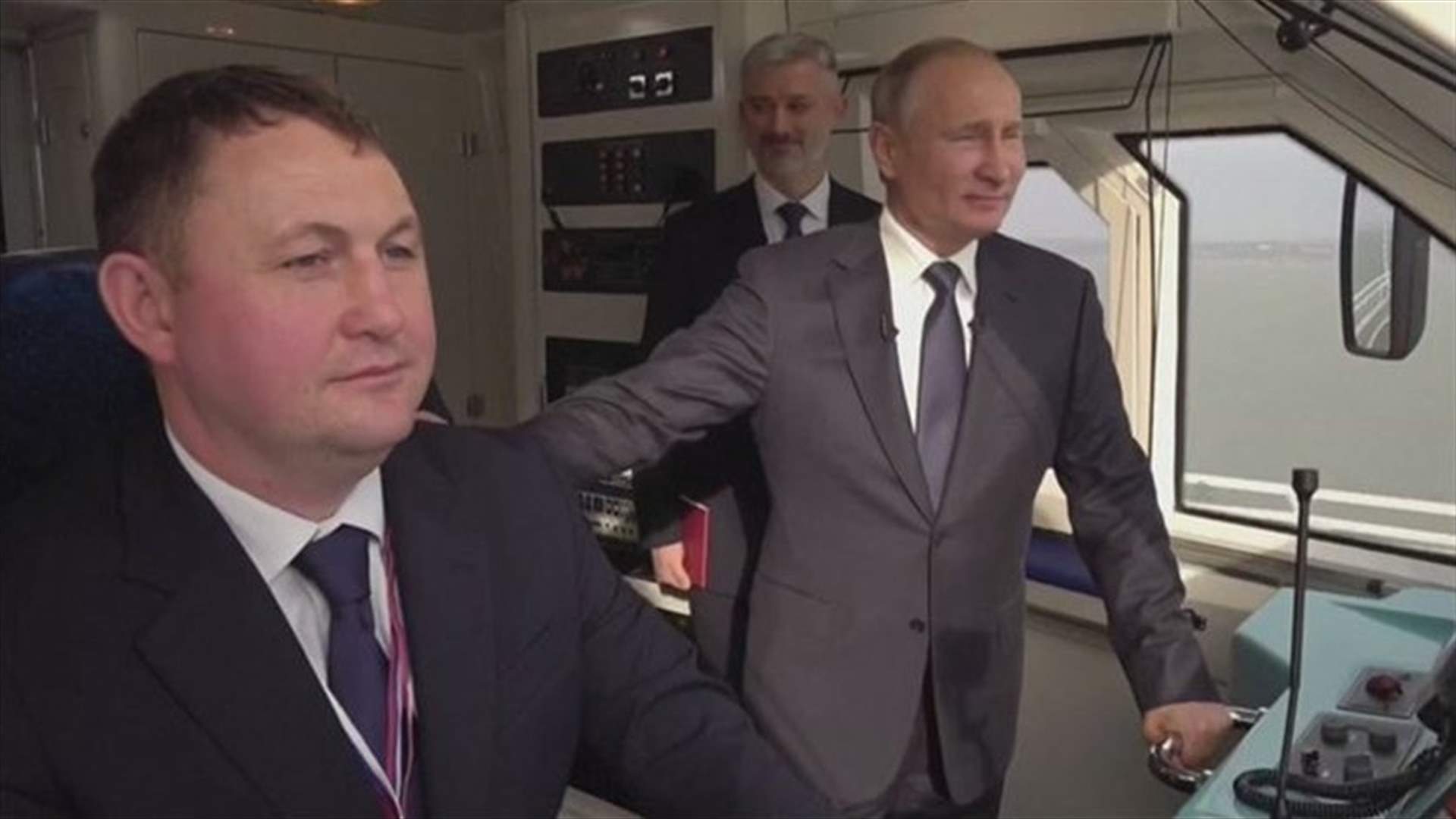 Putin opens Russian rail route to annexed Crimea