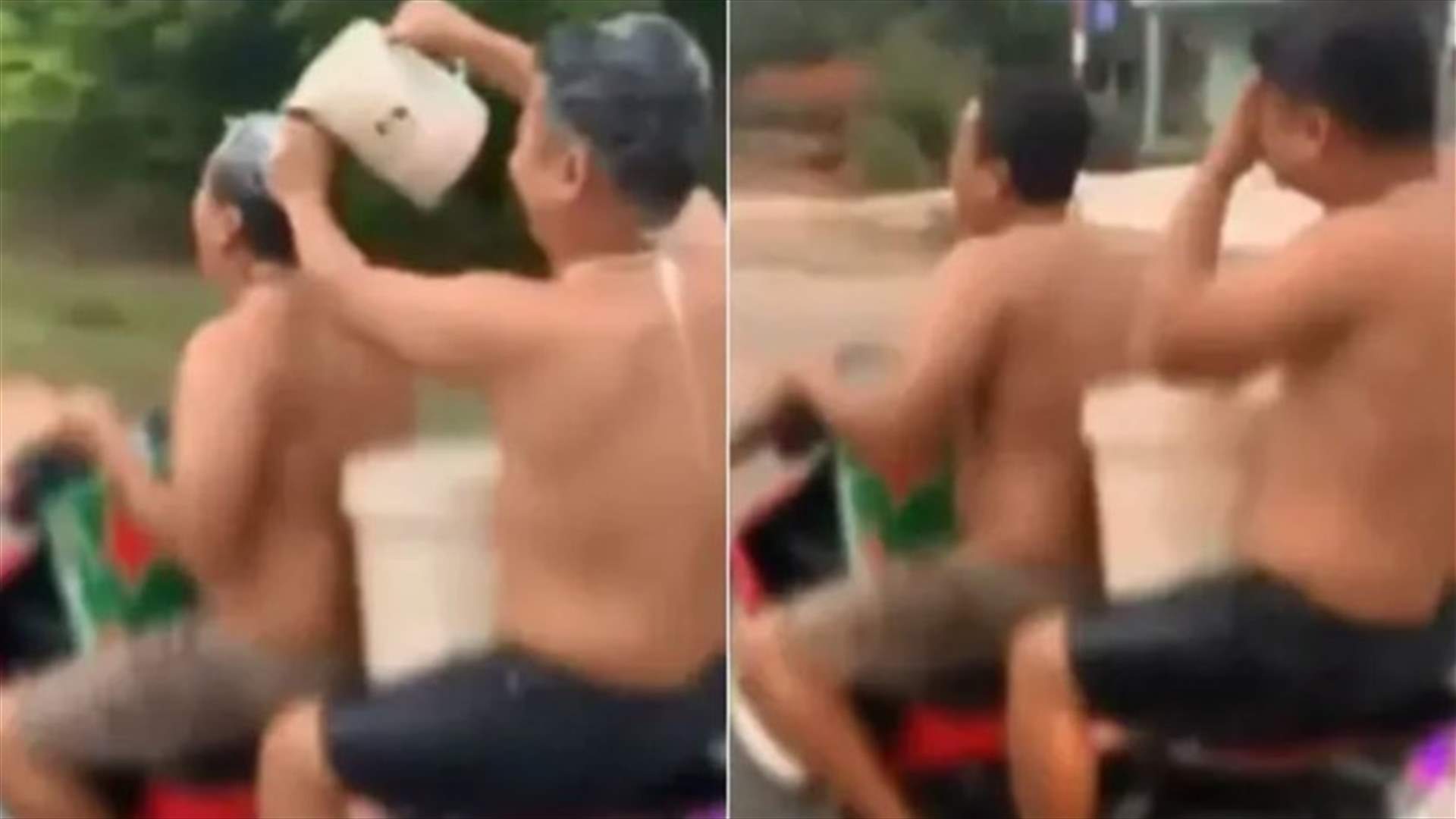 رجلان يستحمان أثناء ركوبهما دراجة نارية... مشهد غريب يحّرك الشرطة (فيديو)