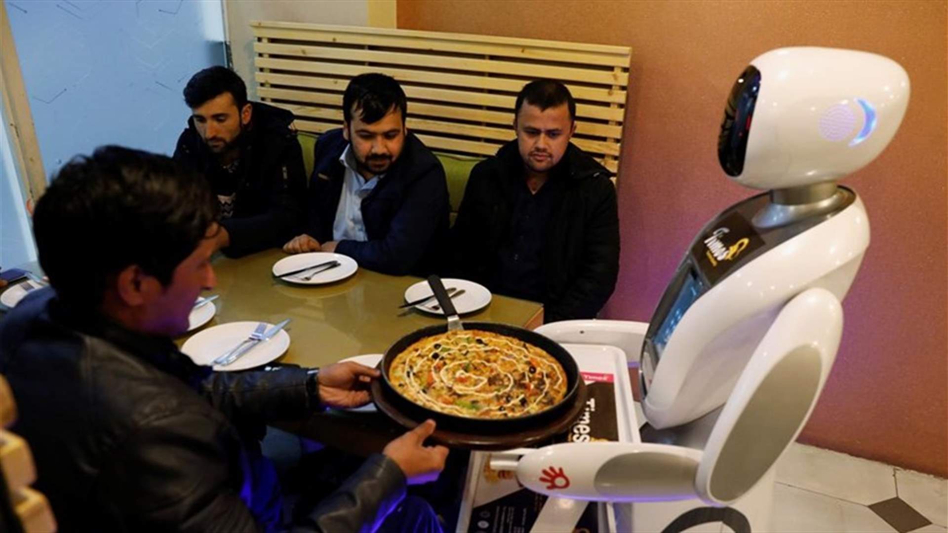 Robot serves up food in Afghanistan for the first time