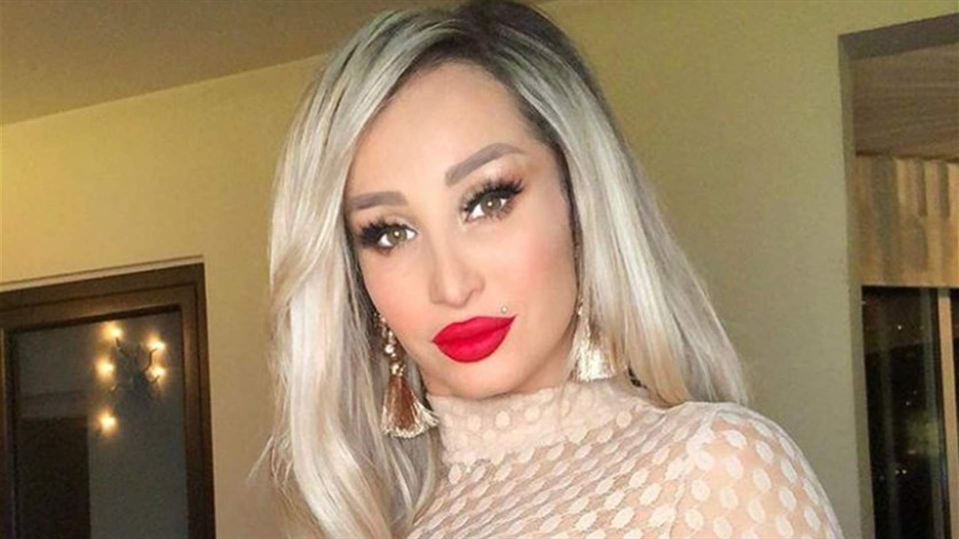 مايا نعمة بشعر بنفسجي مائل إلى الأخضر.. وهكذا تستعد لمسابقة "بكيني" جديدة (صورة)