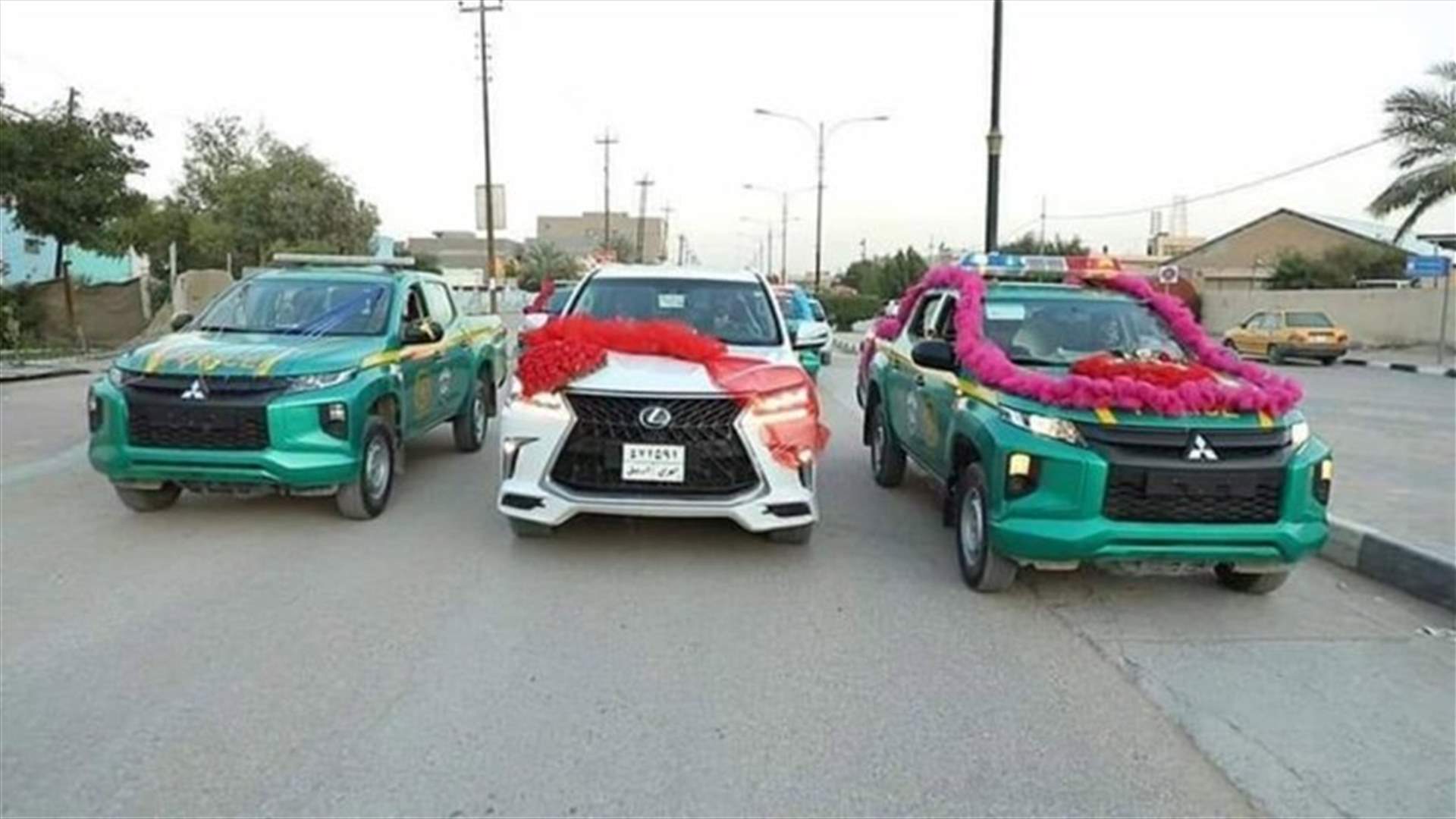 الشرطة العراقية تزف عروسين في ظل كورونا! (صور وفيديوهات)