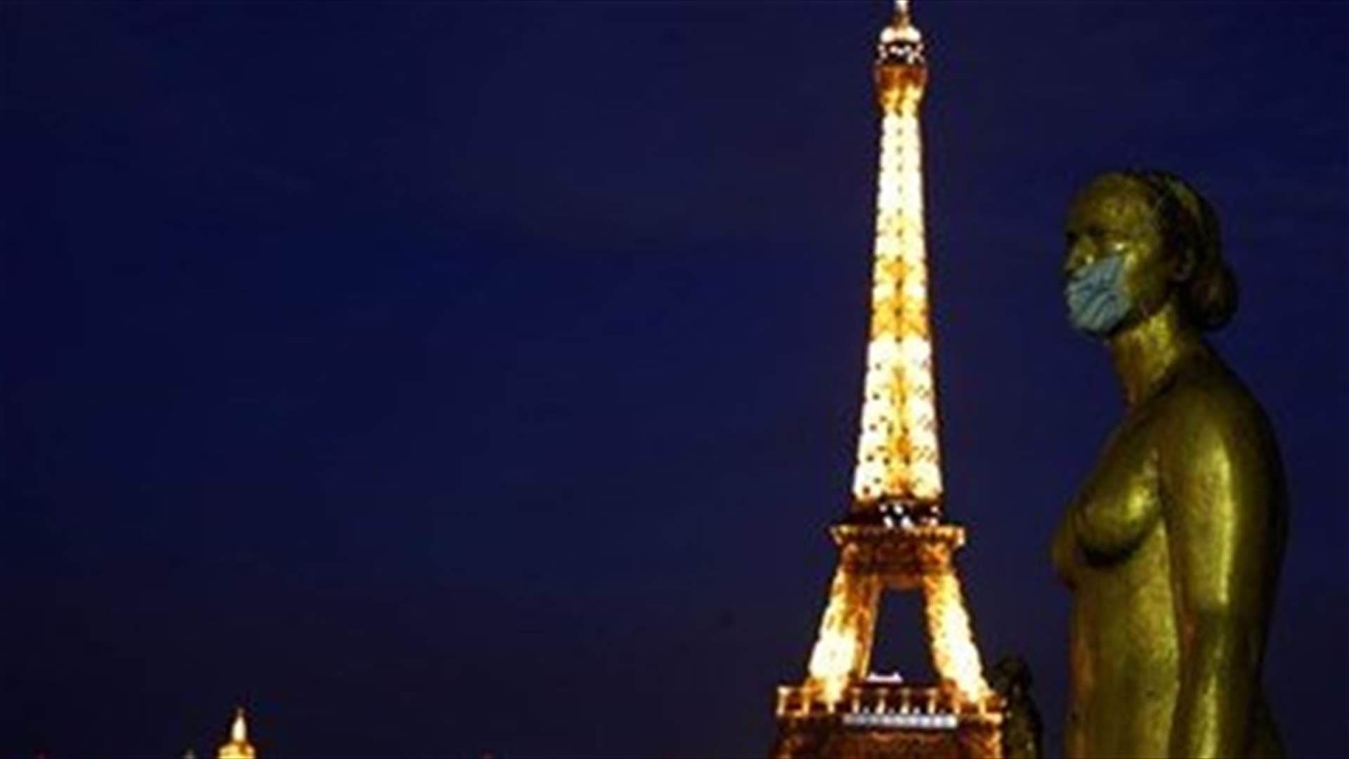 France&#39;s Eiffel Tower sparkles in support of health workers