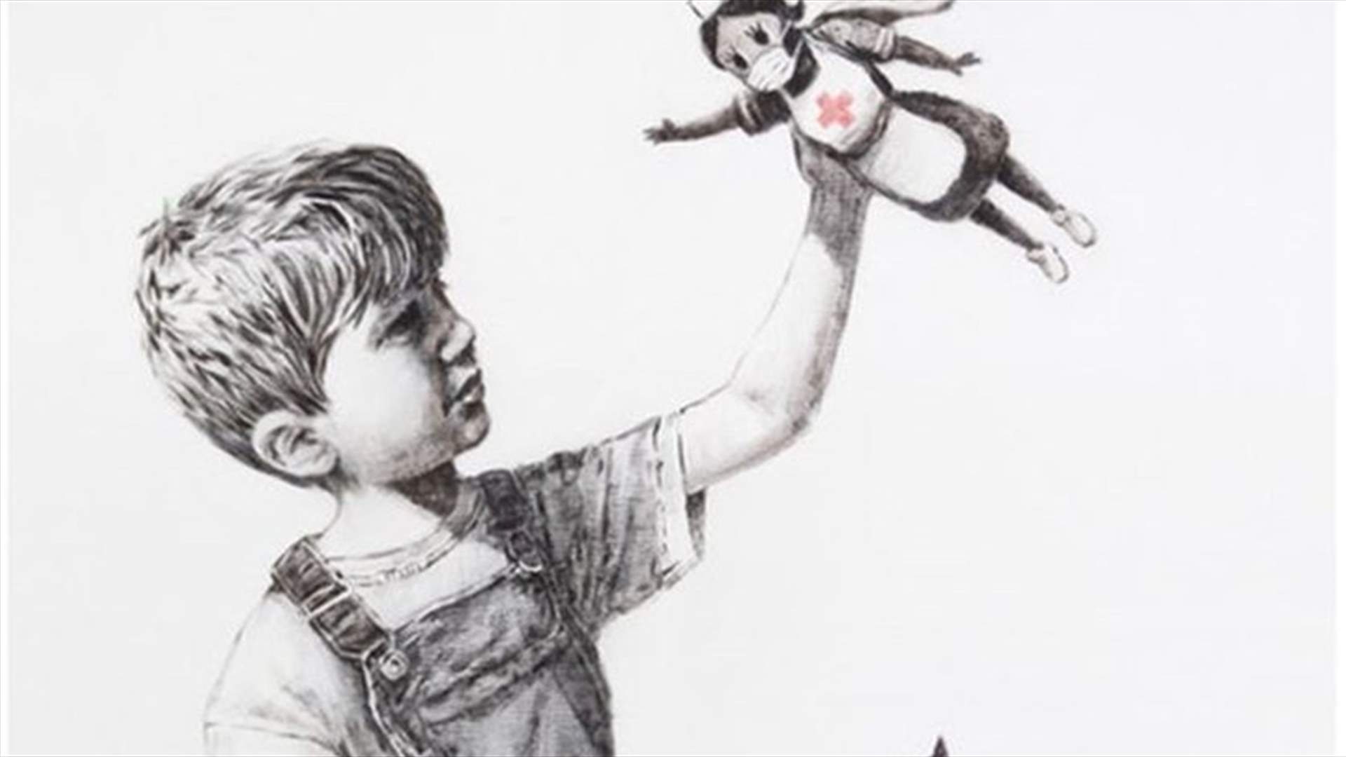 Artist Banksy pays superhero tribute to Britain&#39;s NHS staff