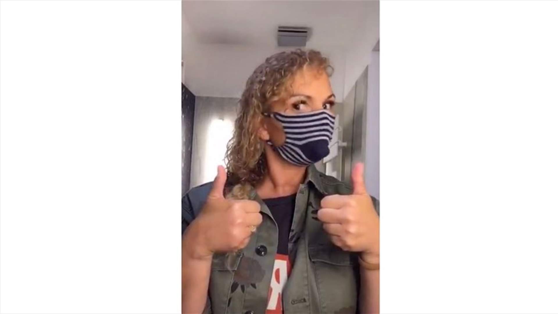 فيديو لسيدة يجتاح الانترنت... شاهدوا كيف صنعت كمامة باستخدام جورب!