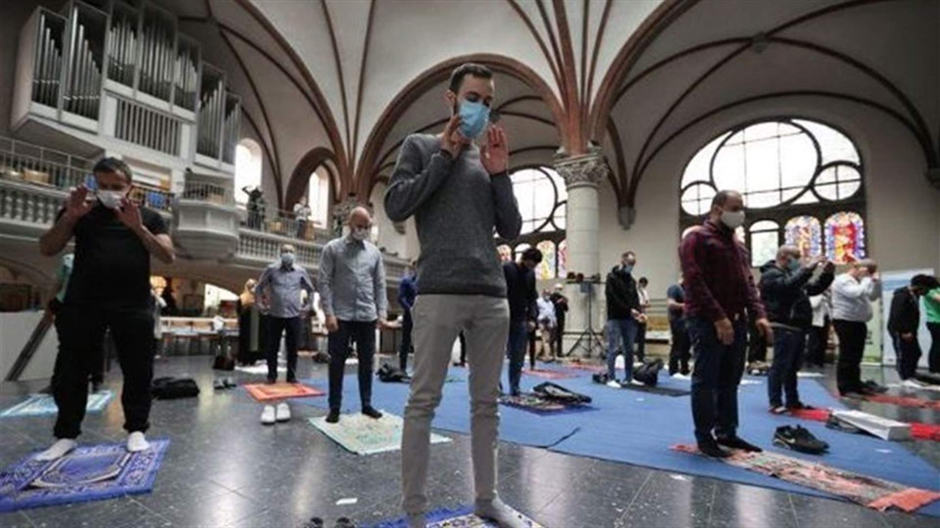 Muslims pray in Berlin church to respect social distancing rules