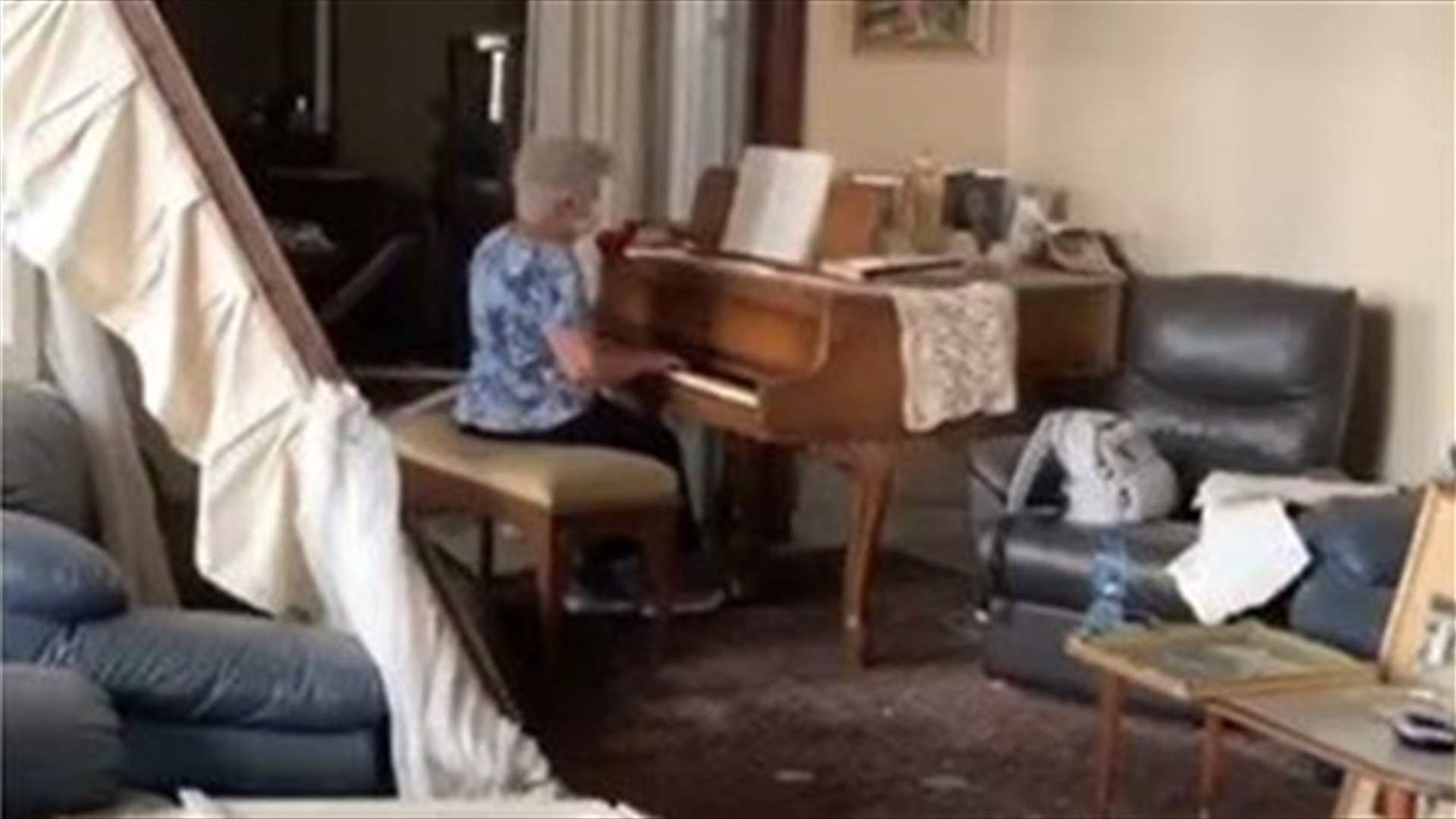 Woman plays piano in her destroyed home after explosion-[VIDEO]
