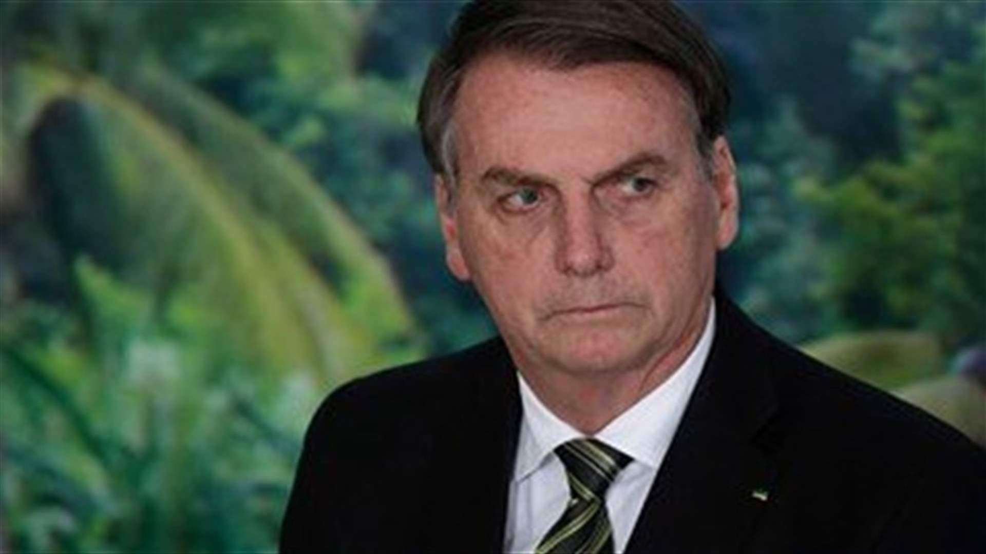 Brazil's Bolsonaro says he wants to punch reporter in face