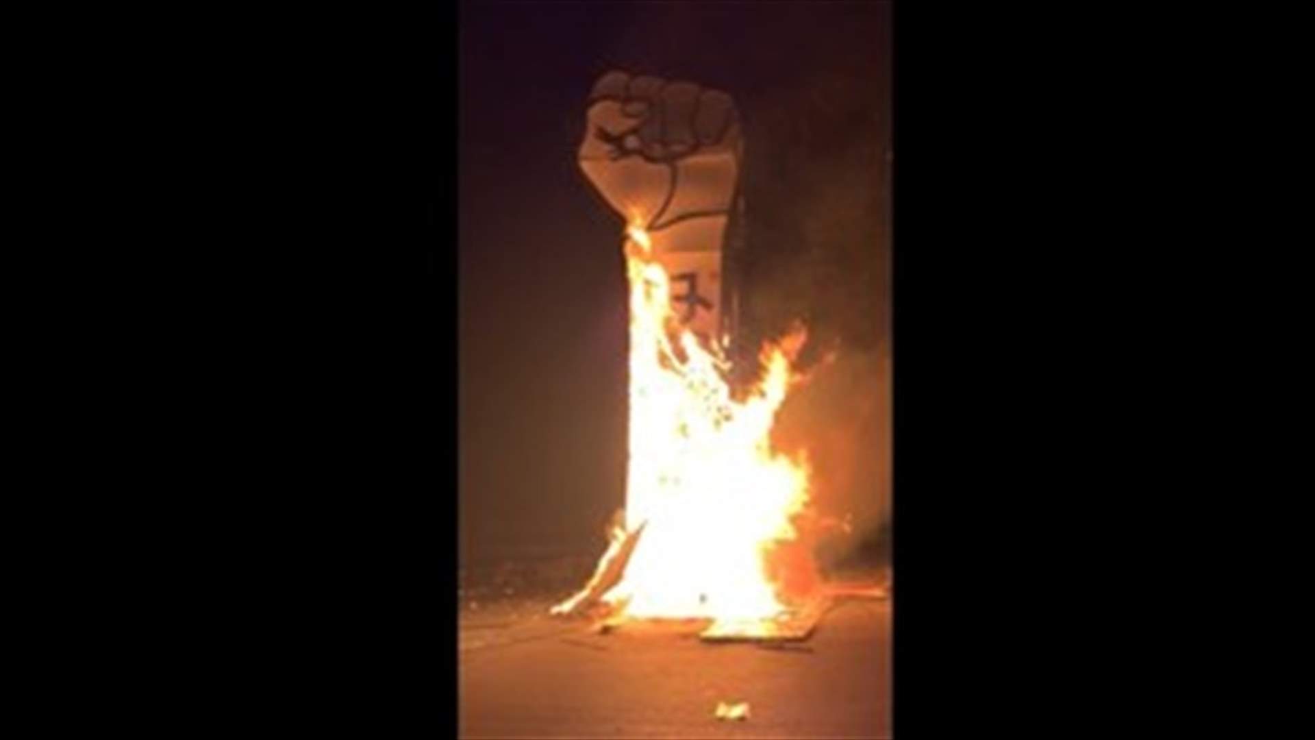 Revolution fist set on fire in Downtown Beirut-[VIDEO]