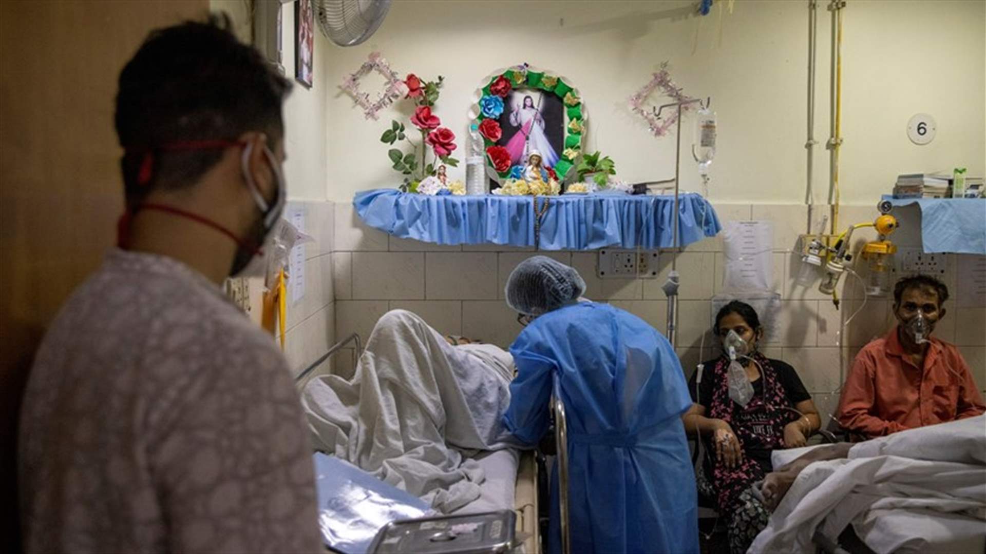India's COVID-19 daily cases stay near record, another state imposes lockdown