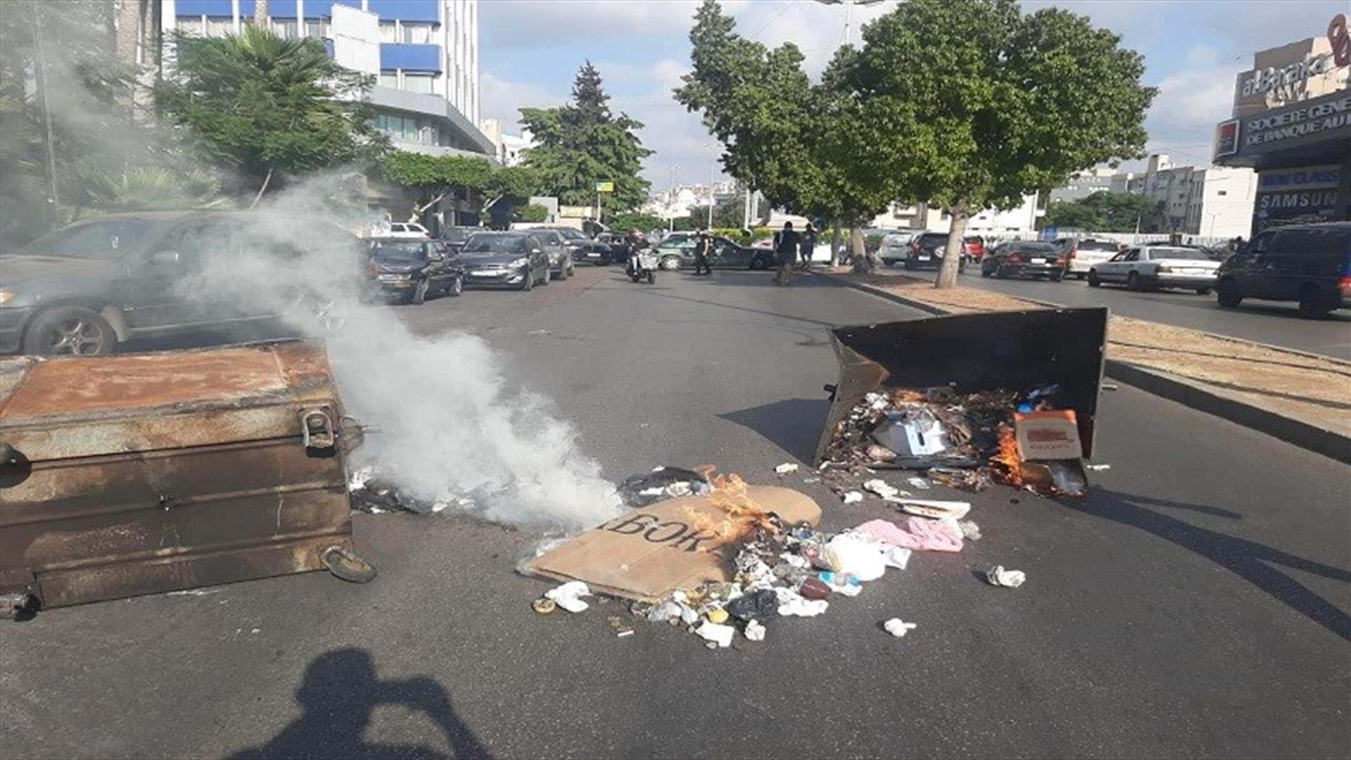Protesters block the road in front of Electricity company in Sidon with waste containers-[PHOTO]