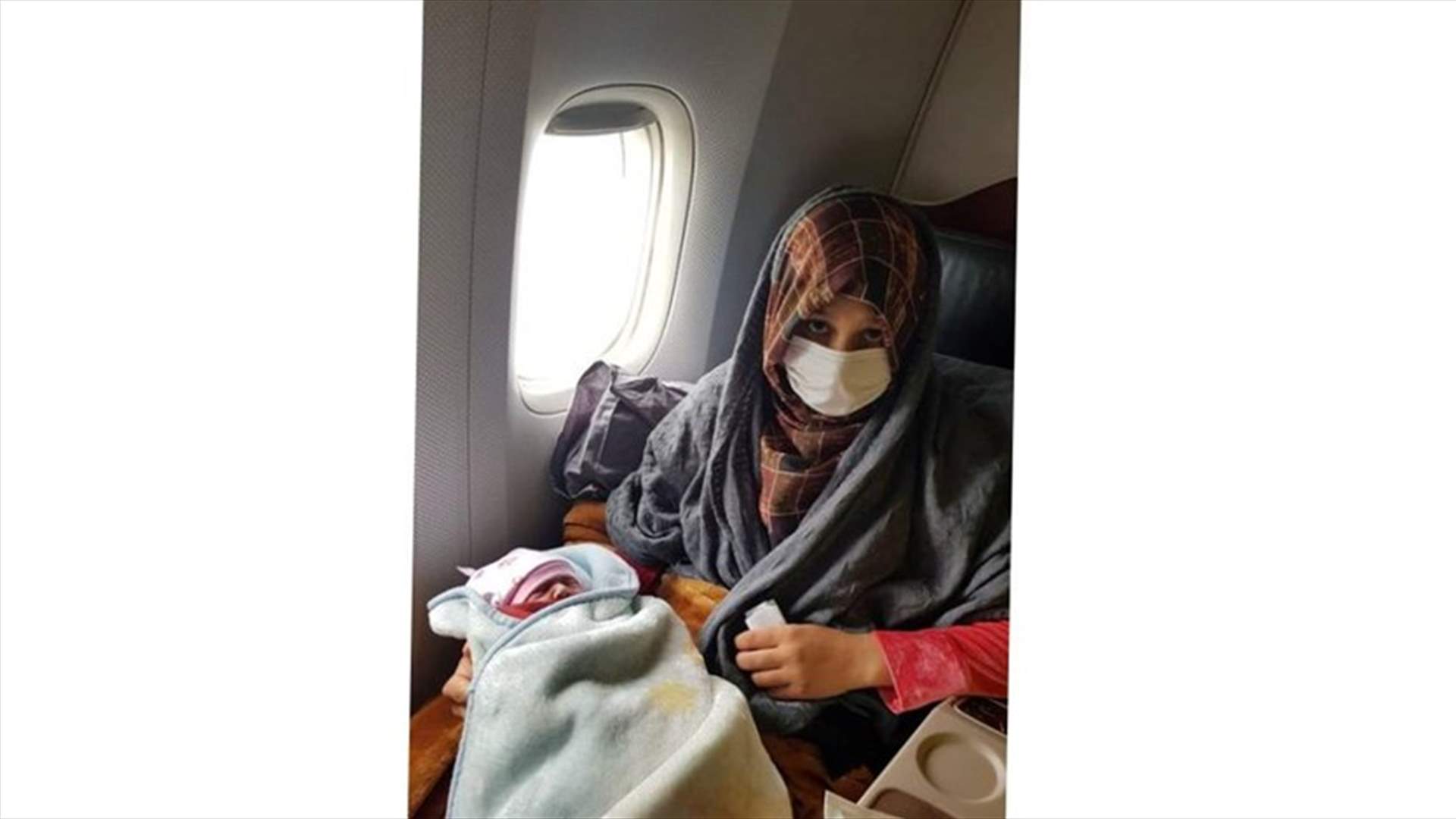 Afghan woman gives birth on evacuation flight to Britain