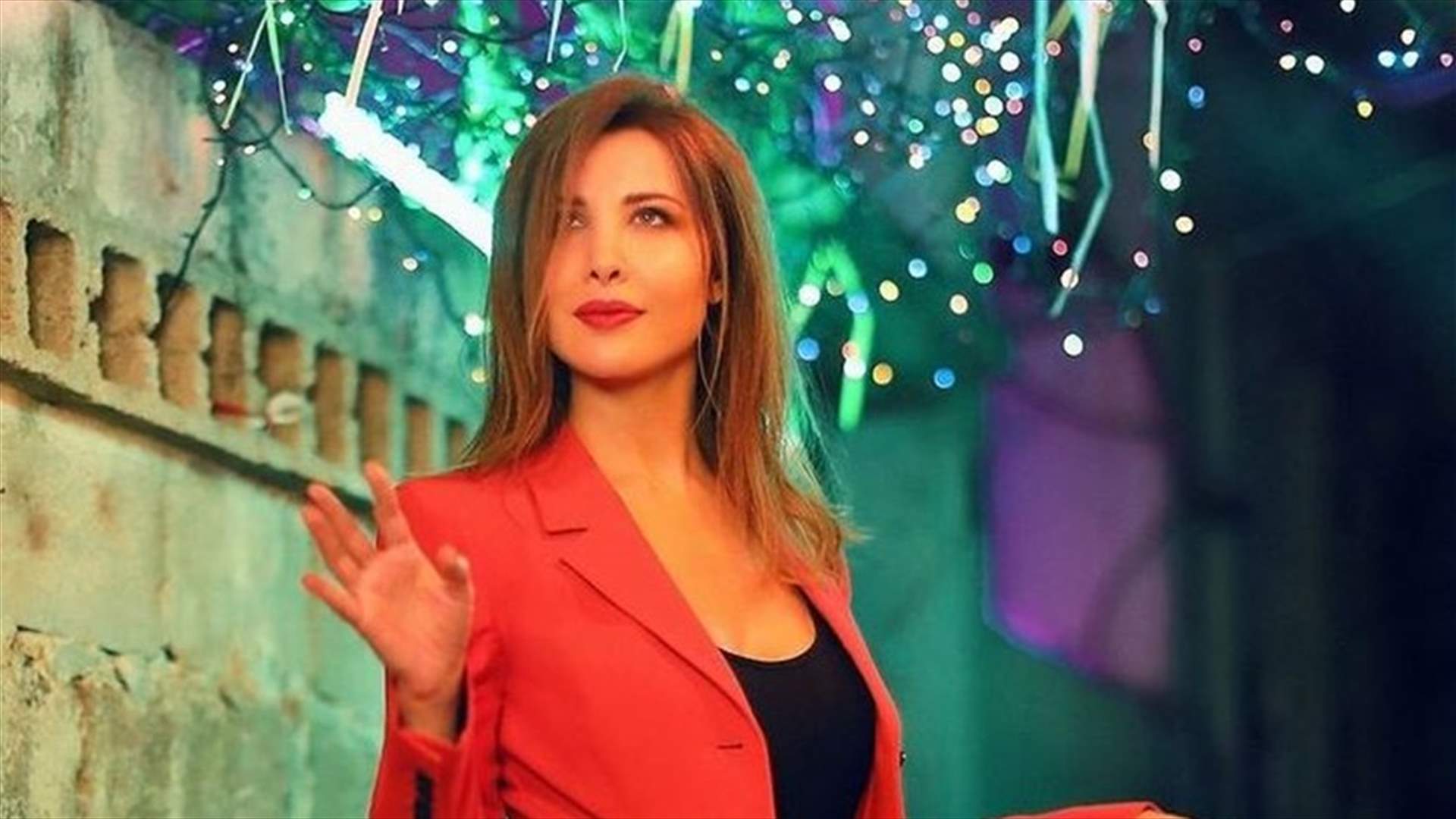 قيمة فستان والدة نانسي عجرم تثير جدلاً واسعاً... فكم بلغ سعره؟