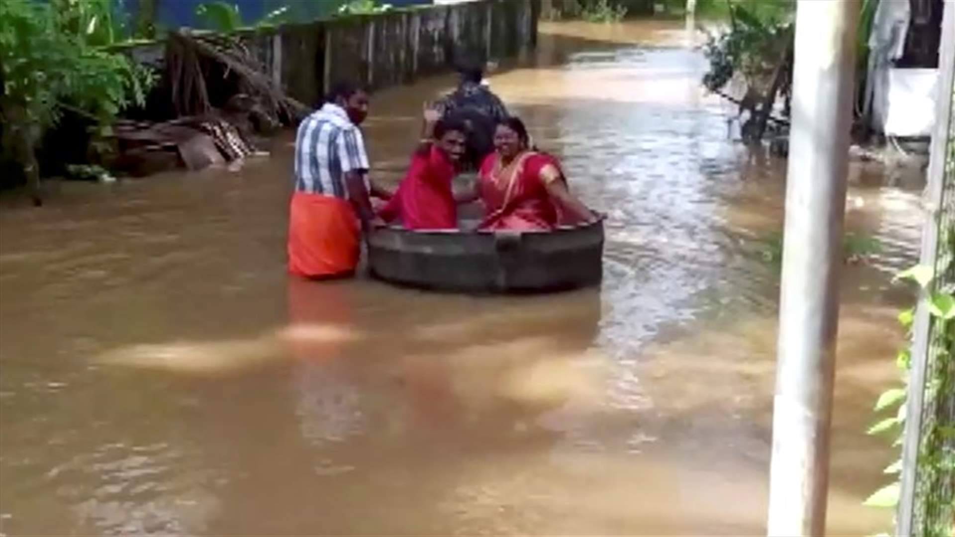 Floods force Indian couple to float to their wedding - in a cooking pot-[VIDEO]