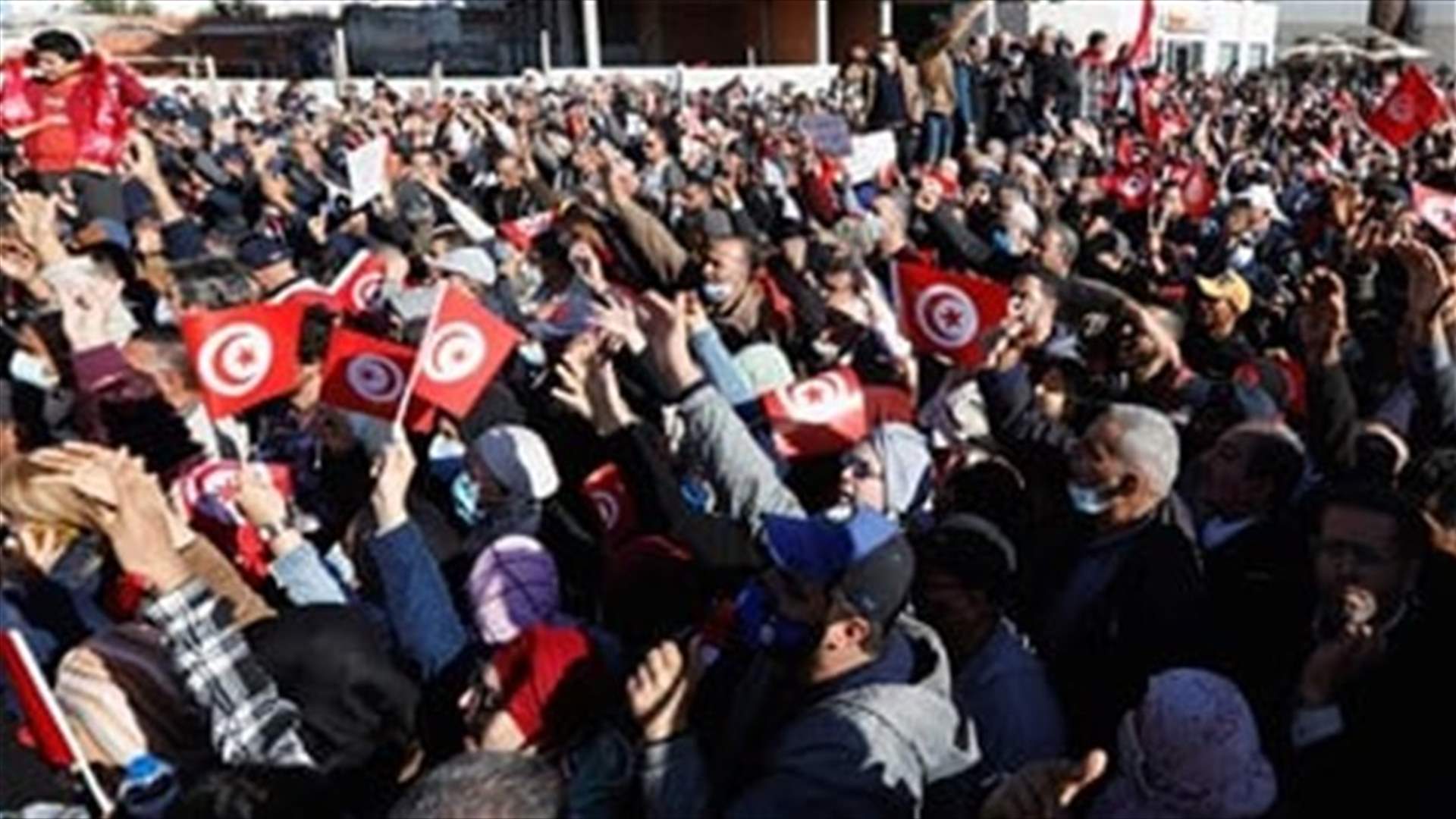 Tunisian protesters try to march on suspended parliament