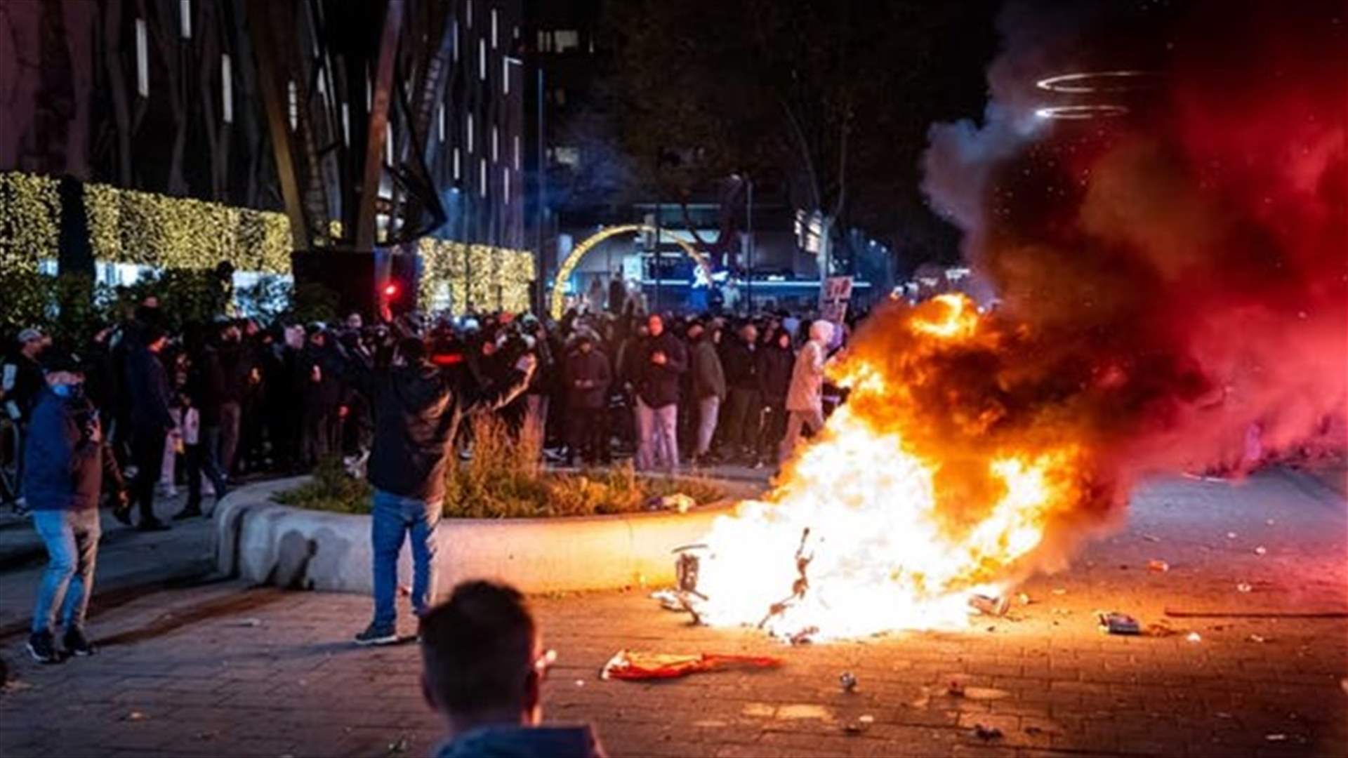 Two wounded as Dutch police fire shots at protest over new COVID-19 restrictions