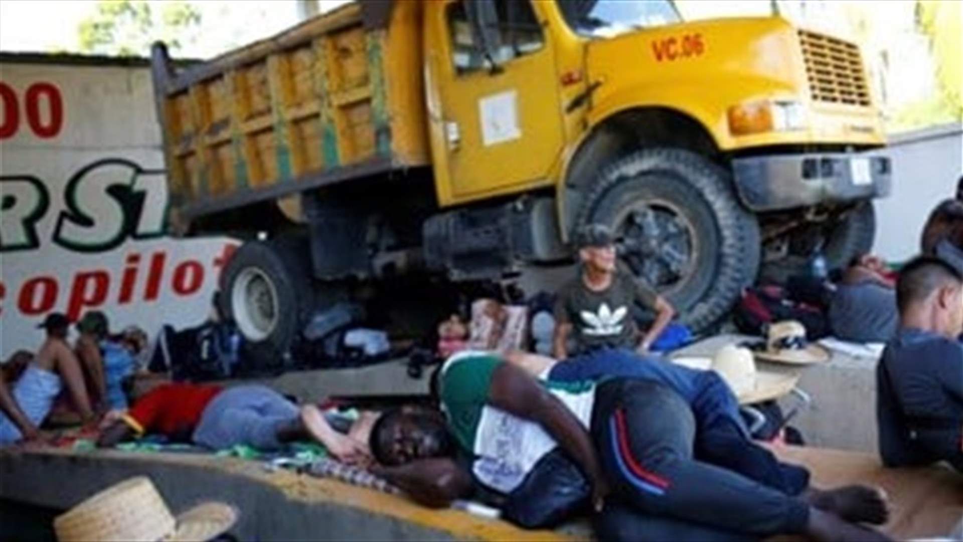 Migrants from 12 countries among 600 found in two trucks in Mexico