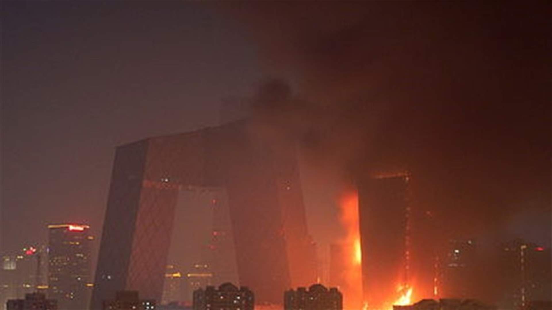 About 150 people trapped on roof of Hong Kong building after fire
