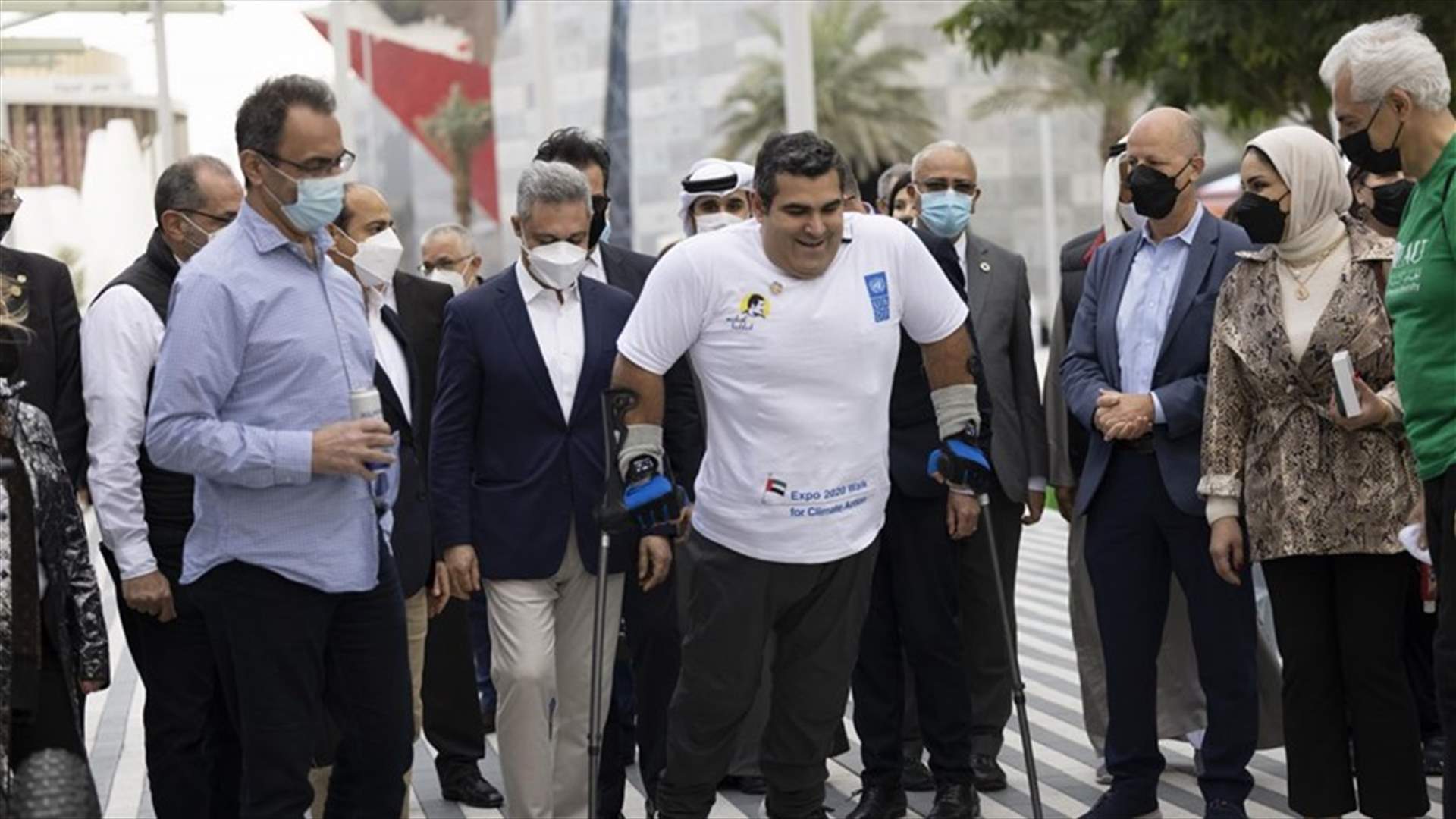بهدف مواجهة التغيّر المناخي... مايكل حدّاد يتحدّى نفسه ويقود مسيرة في إكسبو 2020 (فيديو)