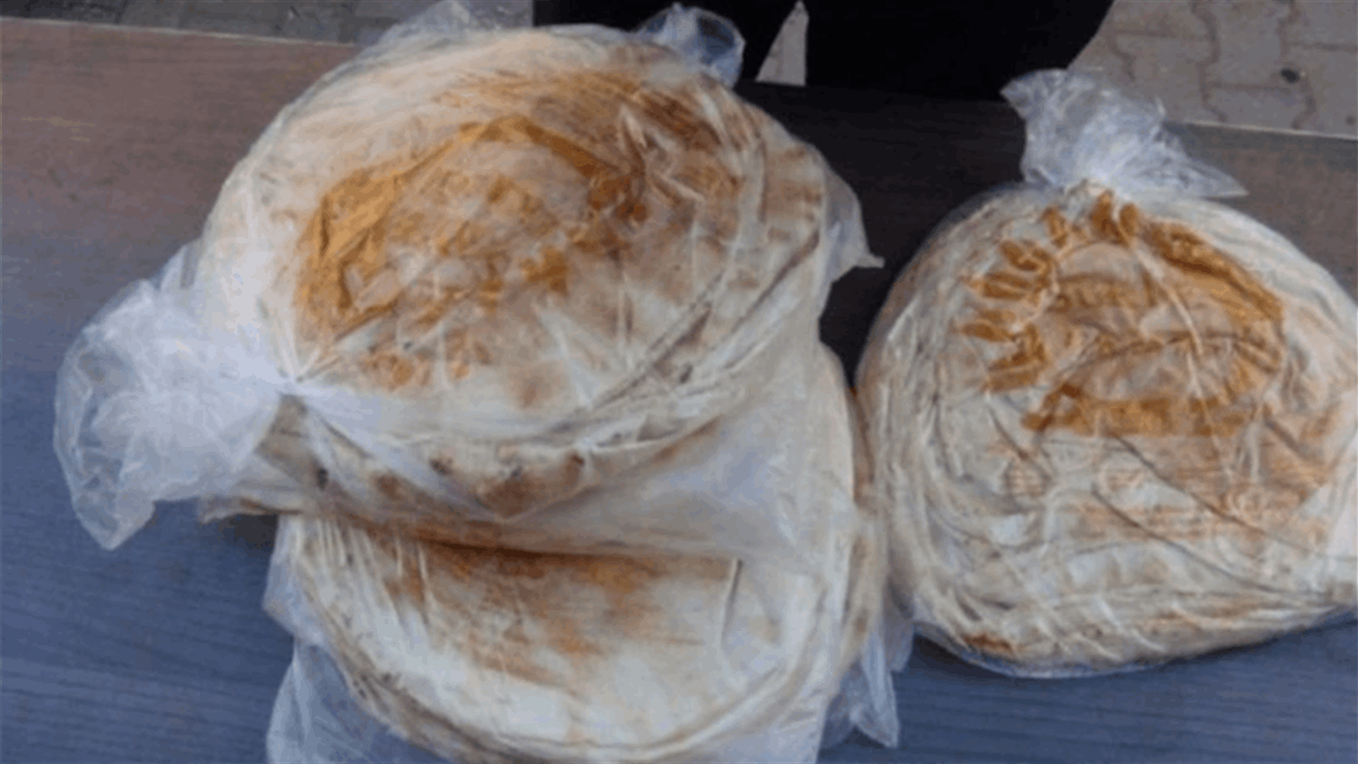 In Nabatieh, bread bundles are sold at black market price