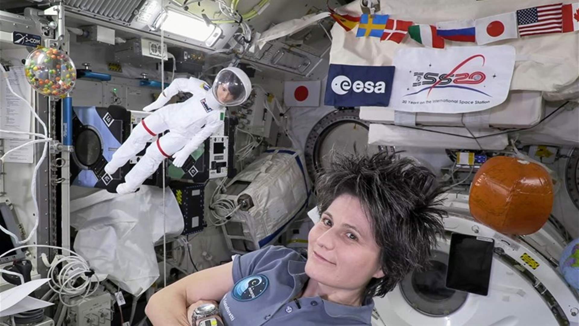 Space station&#39;s Italian commander, with lookalike Barbie, tells girls about science in orbit