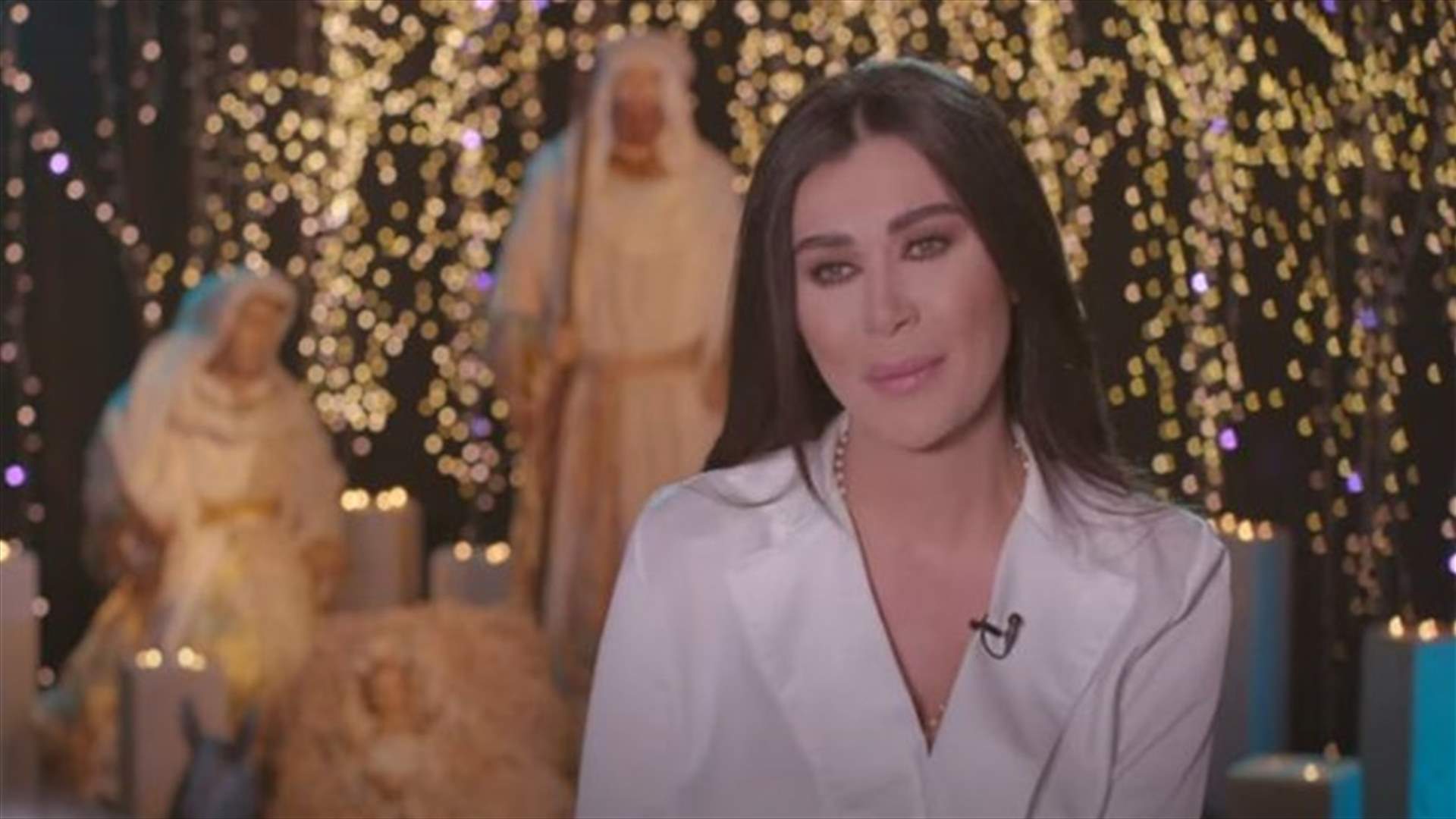 &quot;ضوّي شموعن&quot; مع نادين الراسي... الأمل من رحم الألم في عيد الميلاد (فيديو)