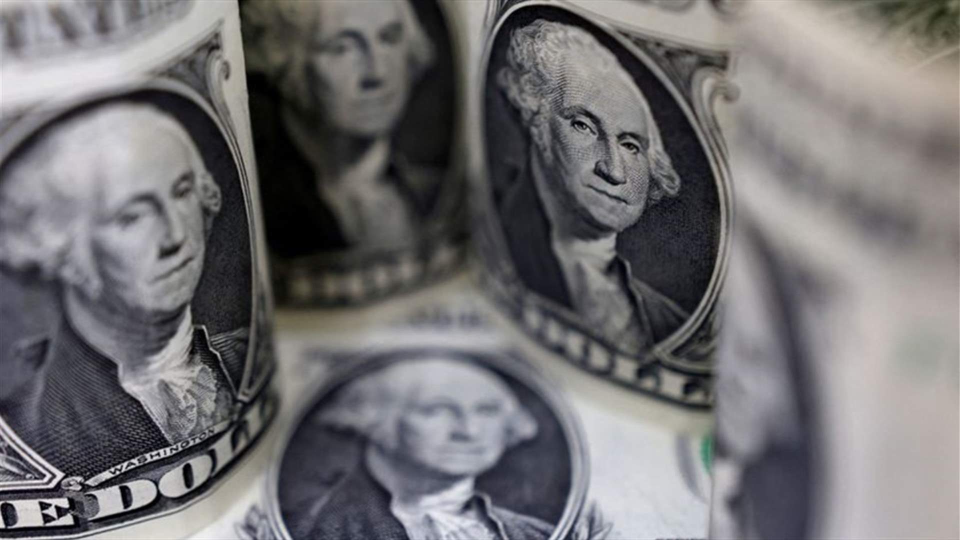 Dollar slips near seven-month lows after jobs data