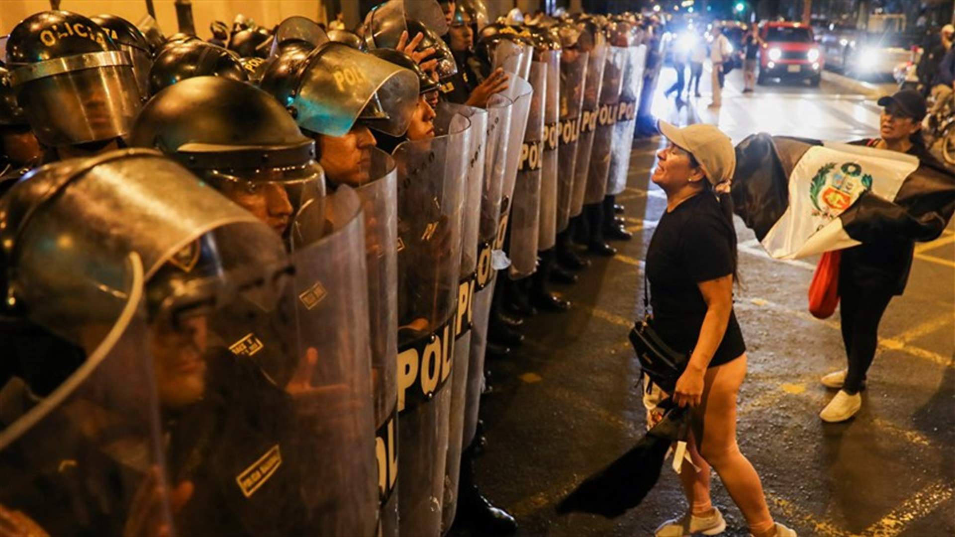 Thousands march in Peru capital demanding president step down