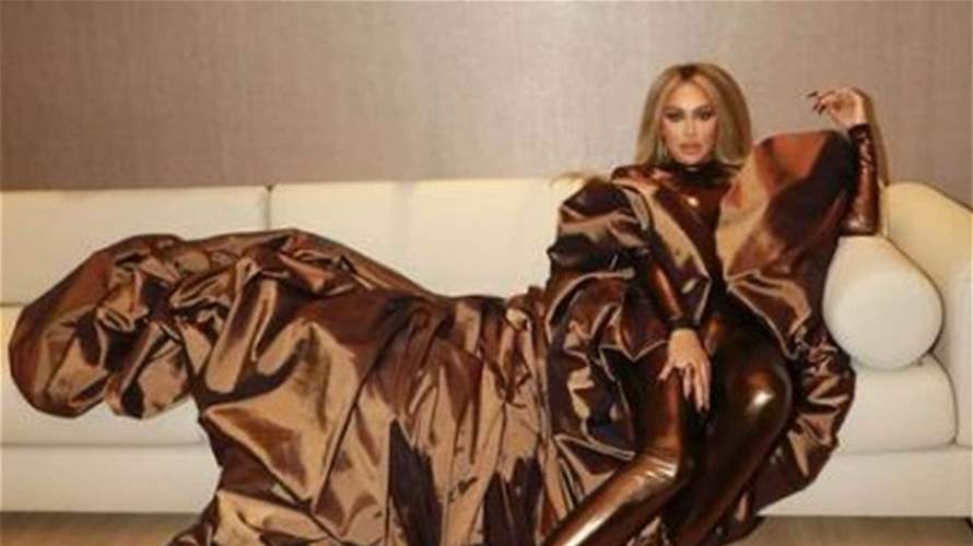 مايا دياب تتبرّع بفستانها لشراء الهدايا لأطفال لبنان