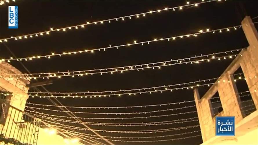قرية ميلادية نموذجية في حي قديم في علما الشعب