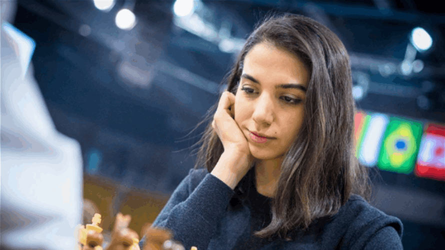 Iranian woman competes at chess tournament without hijab