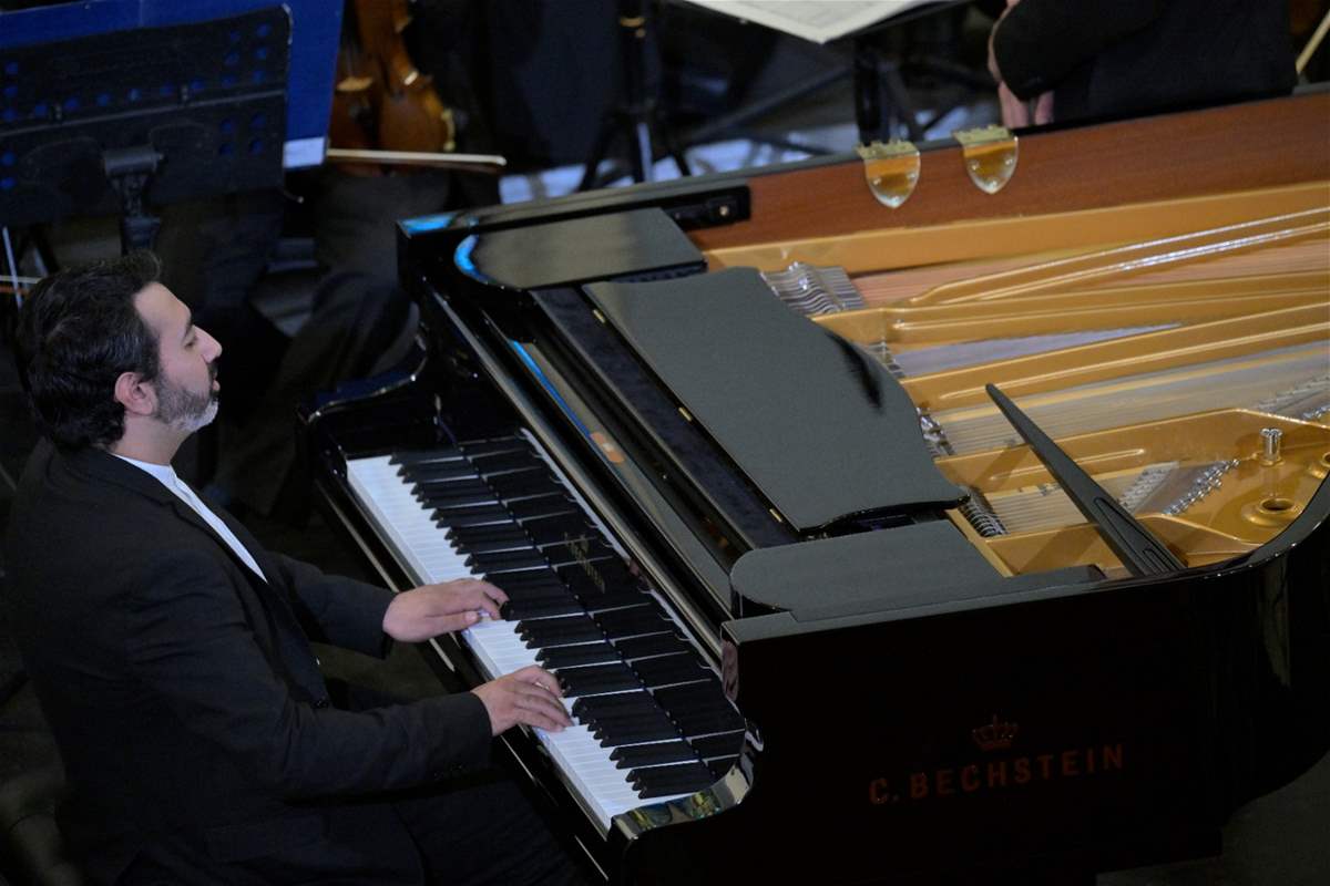 الأوركسترا الفلهارمونية الوطنية... ثنائية إبهار بين القائد لبنان بعلبكي والعازف سعيد (صور)