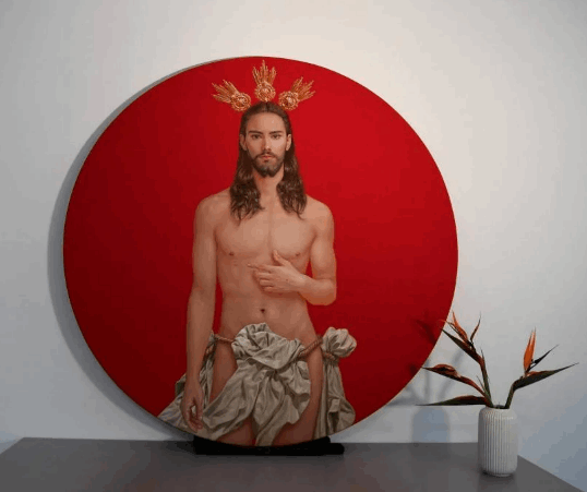  تجسيد أنثوي مهين يحمل طابعا جنسيا ... ملصق عن السيد المسيح يثير الغضب في هذا البلد والرسام يرد: عقول مريضة! (صور)