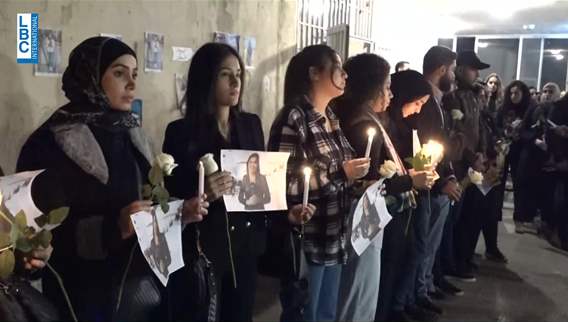 Farah Omar’s friends light candles in her memory in the Faculty of Information