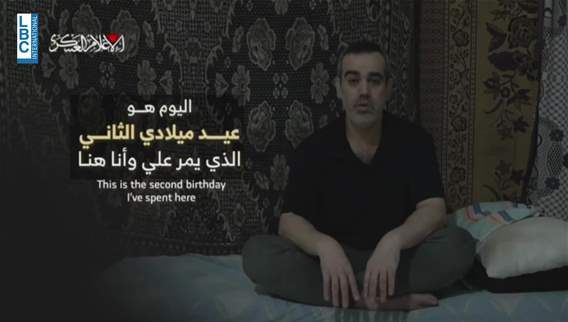 Hamas armed wing releases video showing Israeli hostage alive
